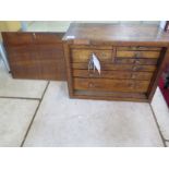 An Oak tool box with eight internal drawers and drop front - 36cm tall 46cm x 23cm