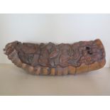 A carved bamboo 44cm long, overall generally good