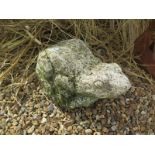 A weathered cast stone garden sculpture of a frog sitting on a rock - 28cm W x 39cm Long