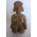 A Pre-Columbian or later terracotta figure of a kneeling woman - 14cm tall, chipping to front