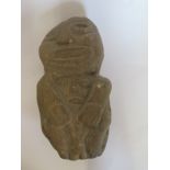 A carved stone figure with child, 20cm tall, no obvious damage