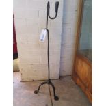 A wrought iron Rush lamp, 79cm tall