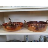 Two copper jam pans, 46cm and 49cm wide, a copper kettle and a tankard, all clean and and