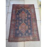 An Old Baluchi rug 137 x 88cm