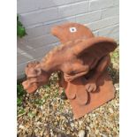 A large terracotta roof ridge tile of a dragon keeping guard 31cm w x 53cm D x 45cm H