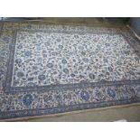 A hand knotted woollen Kashan rug - 2.95m x 2m