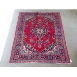 A hand knotted woollen Kashan - some wear, colours bright - 1.53m x 1.25m