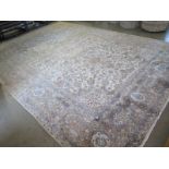 A hand knotted woollen Kashan rug - 4.22m x 2.68m