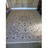 A hand knotted woollen Kashan rug - 3.5m x 2.5m