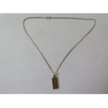 A limited edition 9ct hallmarked ingot pendant, on a 9ct hallmarked chain, chain length 50cm,