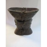 An oriental carved horn stand, 15cm tall x 15cm wide x 10cm, some natural cracks but generally good