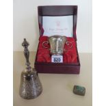 A cased small, silver twin handled cup commemorating Prince Charles and Princess Diana’s marriage,