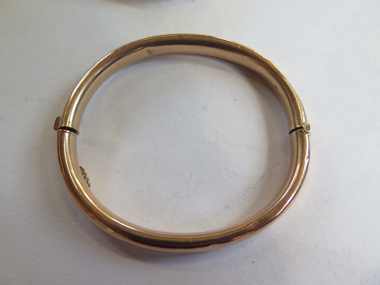 Two 9ct gold bangles, 6.5 x 5.5cm and 6.5 x 6cm, total weight approx 16.4 grams, dents to both , - Image 2 of 5