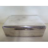 A large silver presentation desk cigar box, London 1913/14, later inscription, silver weight