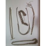 Three silver necklaces and a bracelet, marked 925, and a white metal necklace marked 800, total