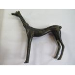 A bronze figure of a standing dog - 23cm tall - good condition