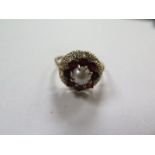 A hallmarked 9ct gold ring set with a single pearl, size Q, approx 3.7 grams, some minor wear