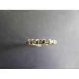 A 9ct yellow gold five stone diamond ring - size N, approx 2.2 grams - diamonds bright minor usage