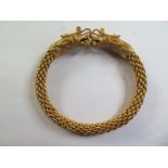 A gilt dragon bangle - 10cmx10cm - some ageing finish to gilt - otherwise good