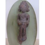 An Eastern carved wood figure head, 27cm tall, on a modern oval backing, condition please see images