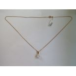 A 9ct yellow gold diamond and pearl pendant on 9ct chain, 40cm long, pearl approx 6mm diameter -