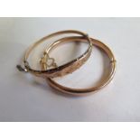 Two 9ct gold bangles, 6.5 x 5.5cm and 6.5 x 6cm, total weight approx 16.4 grams, dents to both ,