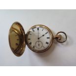 An Elgin gold plated hunter pocket watch, 50mm wide, in clean condition - running in saleroom