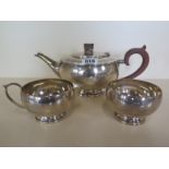A Hukin & Heath Ltd silver teapot, milk jug and sugar bowl, Birmingham 1937, approx 23 troy oz