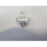 A 9ct white gold topaz and diamond horse shoe ring, size N, approx 2.7 grams, marked 9K - new