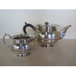 A Carrington & Co. silver teapot and milk jug, London 1920, approx 29 troy oz