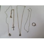 Three 9ct pendants, a 9ct sovereign mount and four 9ct chains, total weight approx 14 grams