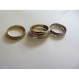 Two 9ct yellow gold rings, approx 5.5 grams, size O - and a 22ct gold ring size L, approx 3.4 grams