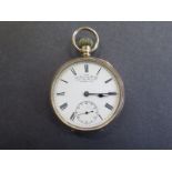 A 9ct yellow gold open face pocket watch with top wind, dial signed TREE 310 Walworth Rd SE and at