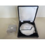 A small silver presentation salver Sheffield 1962/63 - approx 4.7 troy oz - boxed, and a silver desk