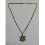 A 9ct pendant on a 9ct chain, both hallmarked, total weight approx 15 grams, chain length 46cm, both