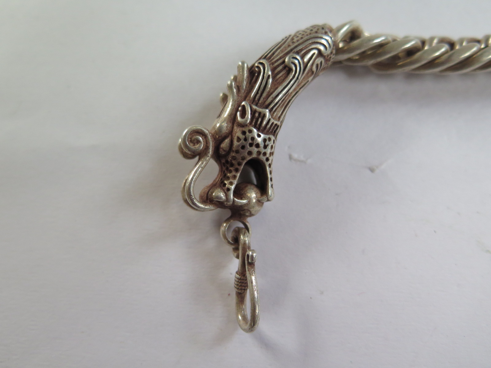 An oriental white metal dragon bracelet, 23cm long, good condition - Image 2 of 2