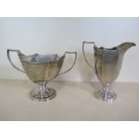 A silver sugar bowl and milk jug Sheffield 1917/18, both clean condition, no engraving, approx 14.