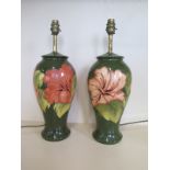 A pair of Moorcroft table lamps 43 cm tall , Both in good condition.