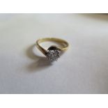 An 18ct yellow gold illusion set diamond solitaire ring marked 18ct - size P - approx 4 grams -