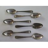 Six Georgian silver teaspoons, approximately 2.4toz, in reasonably good condition but rubbing to