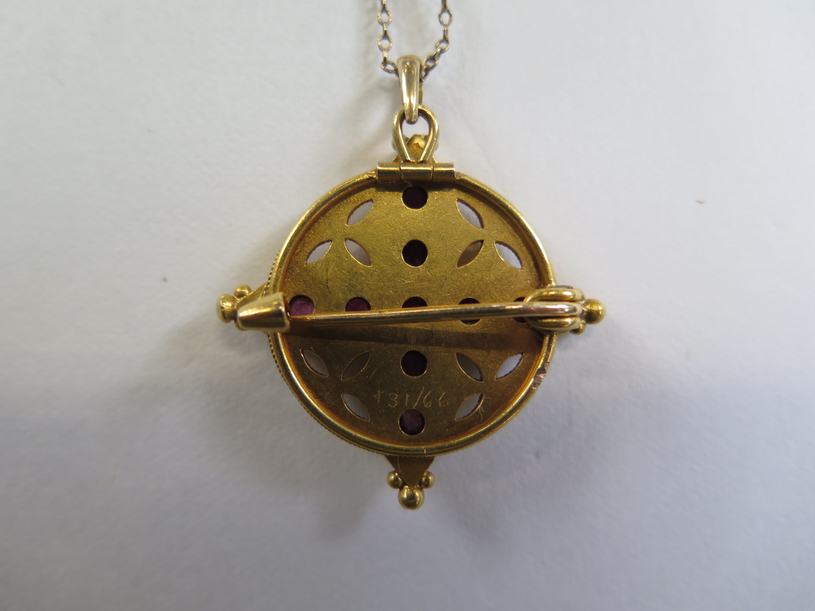 A Victorian gold pendant brooch 30mm x 30mm set with nine pink stones, approx weight 8.7 grams, - Image 3 of 4