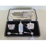 A cased Henry Clifford Davies, silver cruet set hallmarked Birmingham 1956, 4.5toz together with a