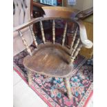 A beech smokers armchair, needing restoration