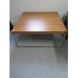 A teak designer coffee table, 92cm x 92cm