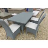 A Bramblecrest Lloyd Loom rectangular table with four side chairs in Atlas grey