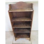 A small four shelf oak book case - 115cm tall x 51cm x 19cm