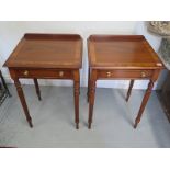 A pair of antique style rosewood lamp tables with a drawer on reeded legs