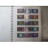 A Guernsey stamp collection in printed binder and album largely complete to 1999 - high face value