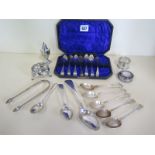 A collection of silver flatware, including an Irish Georgian teaspoon and mostly other Georgian