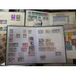 An interesting and eclectic stamp collection in a variety of small stock books, stock cards, album